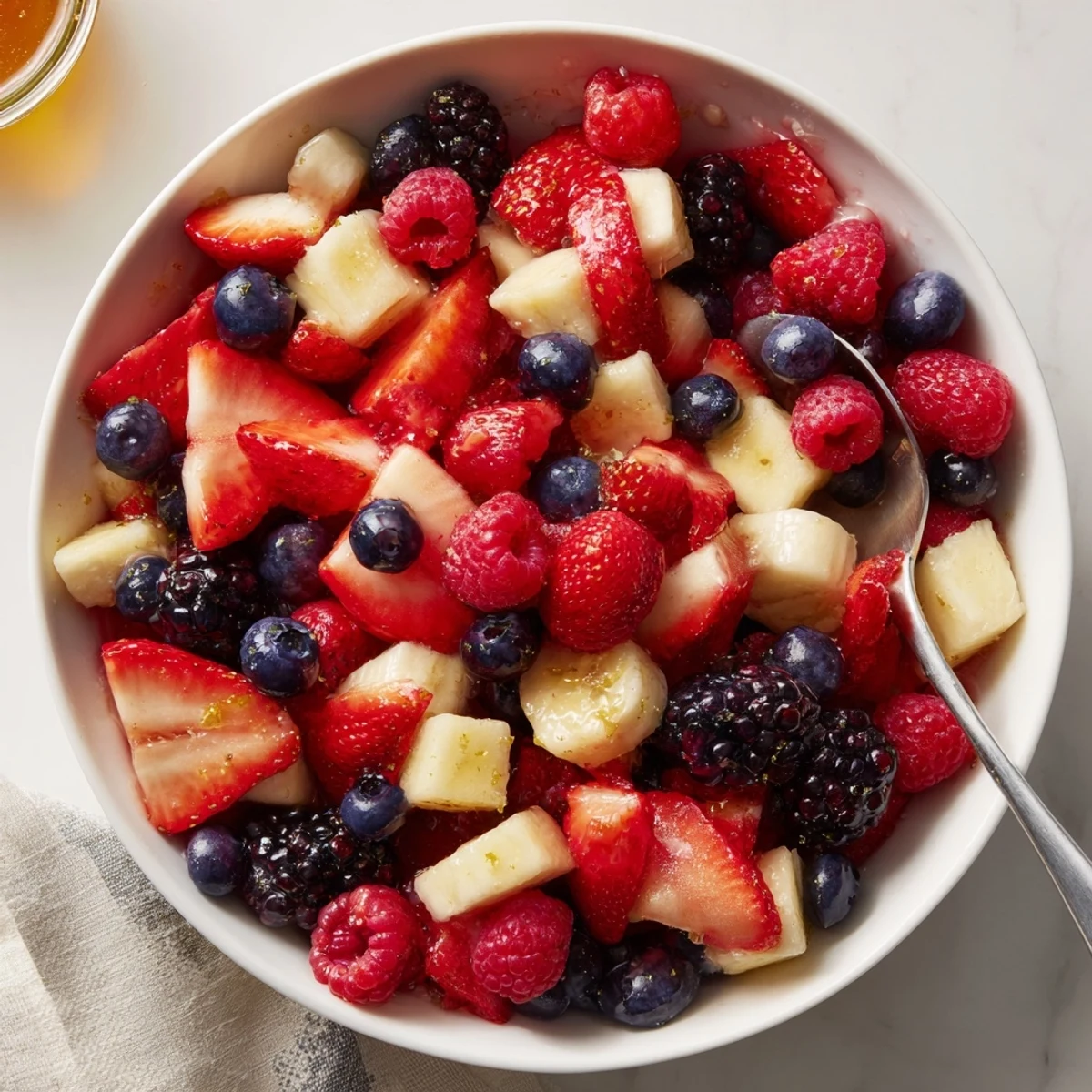 Bright Red White And Blue Fruit Salad served in bowl for Fourth of July