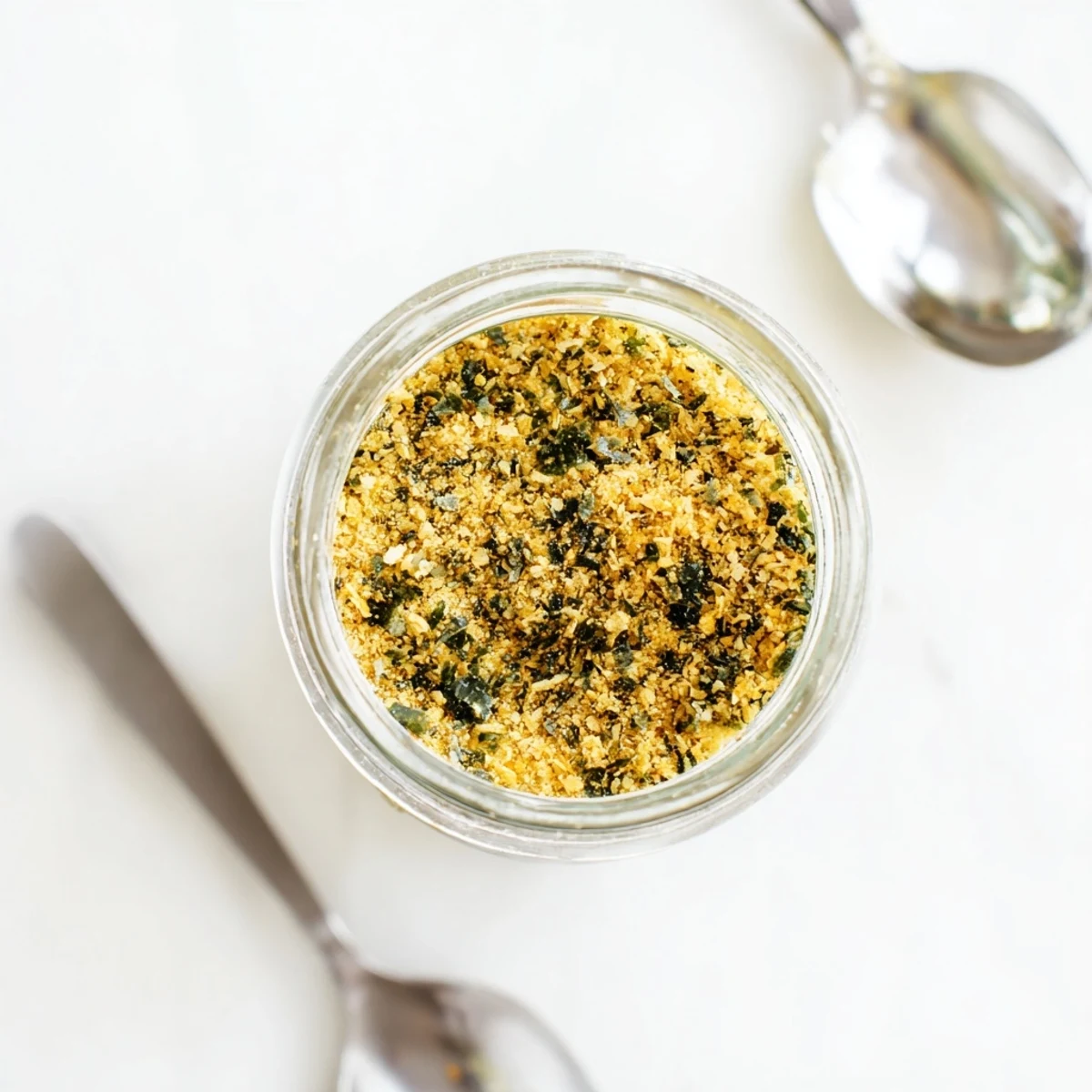 Aromatic gluten free ramen seasoning powder arranged with dried shiitake mushrooms and fresh ginger on bamboo