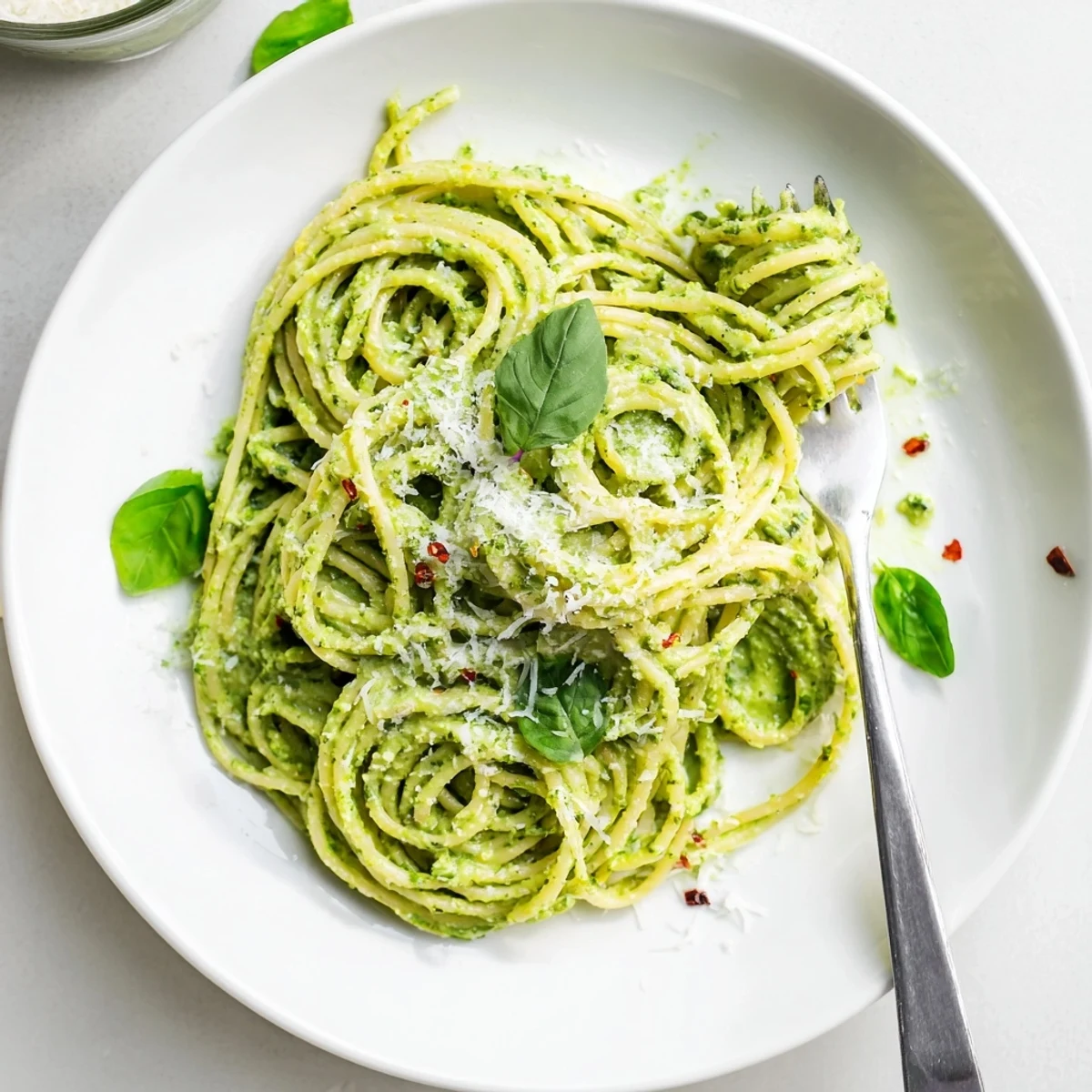 Silky Green Goddess Pasta Sauce coating al dente spaghetti with avocado and lemon zest